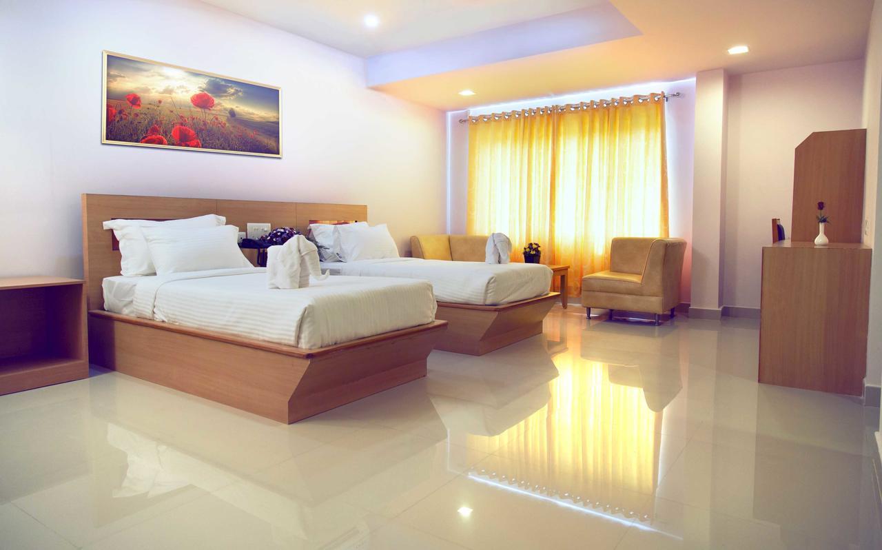 Hotel Rainbow Suites Cananor Exterior foto